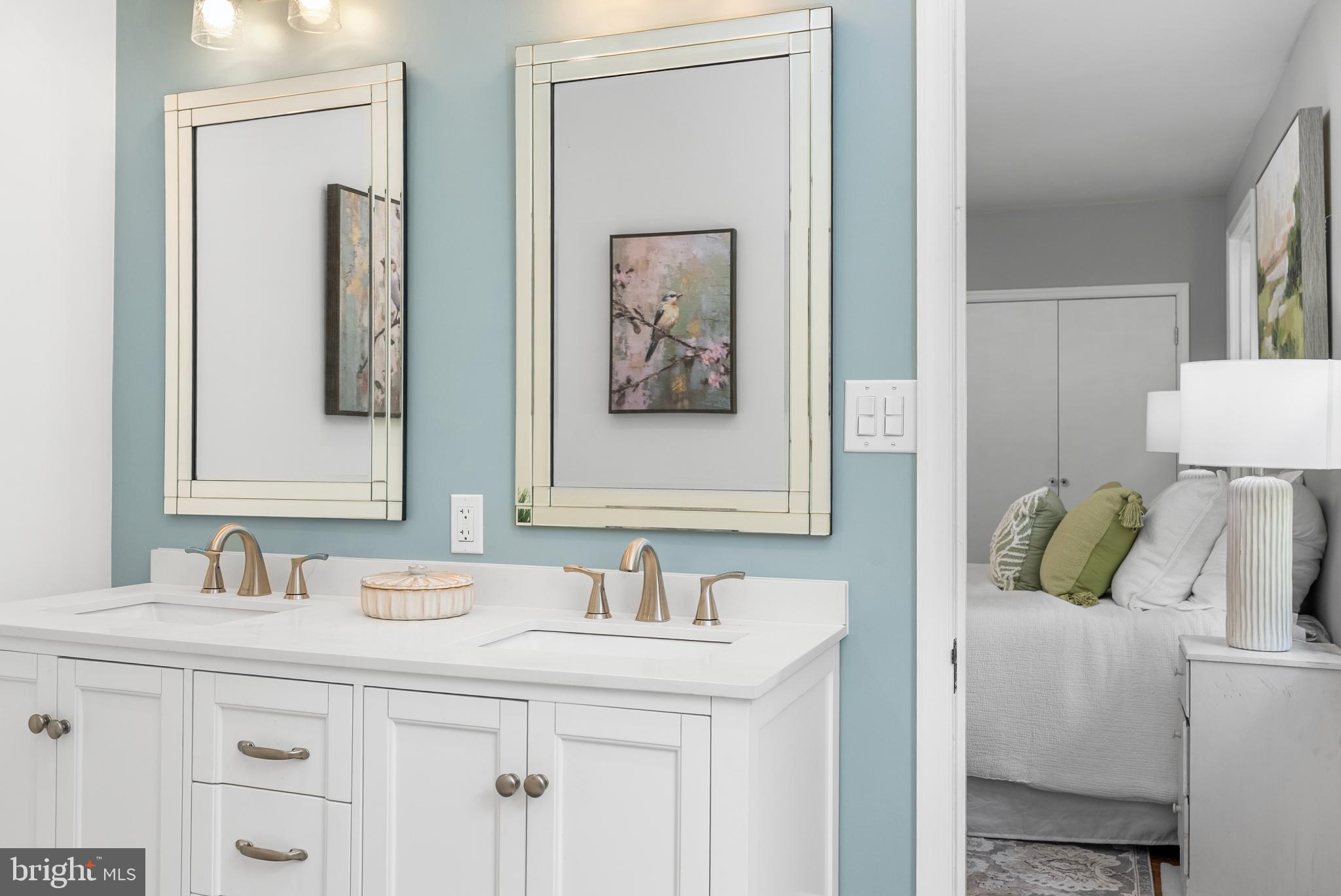 710 Anneslie Road Baltimore, MD 21212 - Photo 23 of 56 Elegant dual-sink bathroom with serene decor.