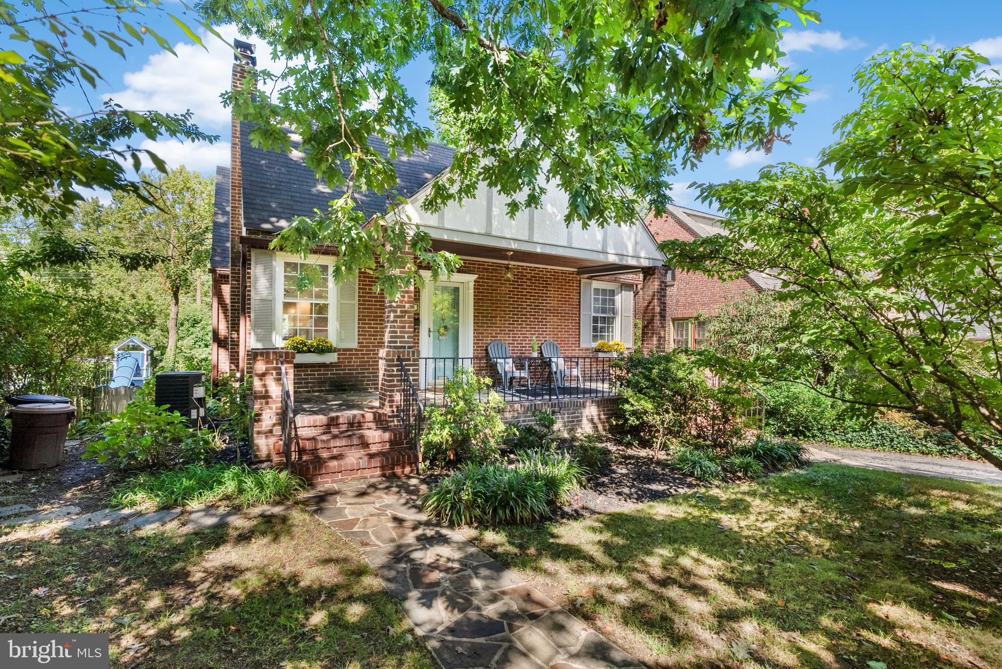 710 Anneslie Road Baltimore, MD 21212 - Photo 3 of 56 Charming brick home with lush greenery.