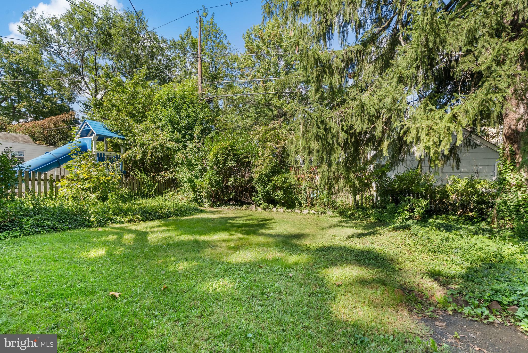 710 Anneslie Road Baltimore, MD 21212 - Photo 45 of 56 Lush backyard oasis with playful slide.