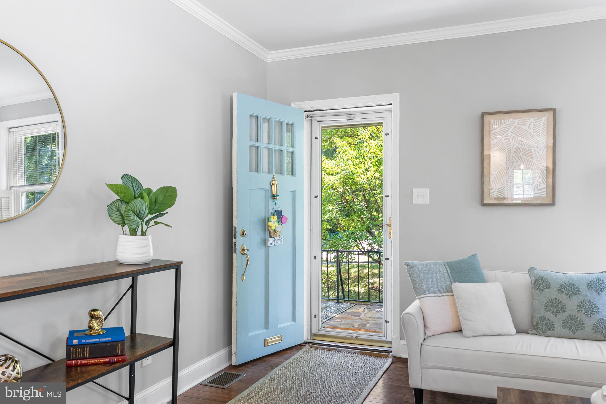 710 Anneslie Road Baltimore, MD 21212 - Photo 6 of 56 Inviting entryway with cheerful blue door.