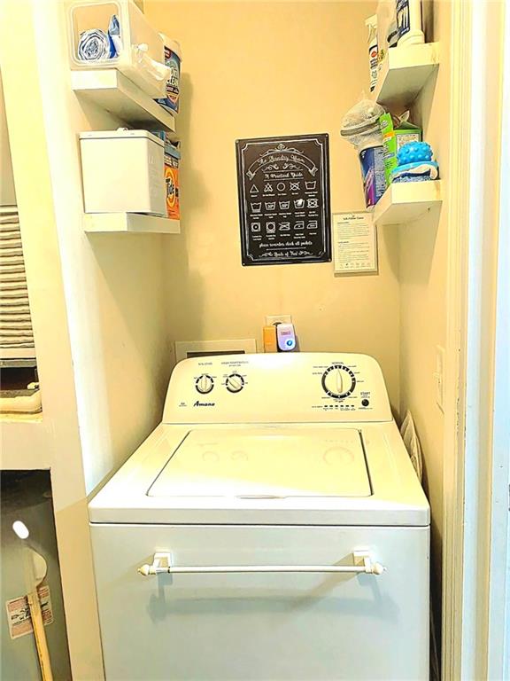 5303 Par 4 Way Lithonia, GA 30038 - Photo 12 of 28 a utility room with dryer and washer
