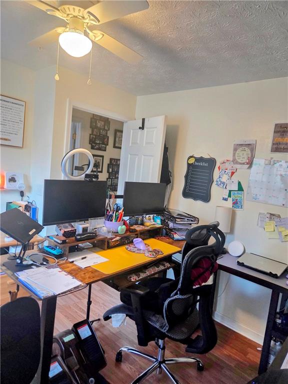 5303 Par 4 Way Lithonia, GA 30038 - Photo 20 of 28 a workspace with furniture and wooden floor