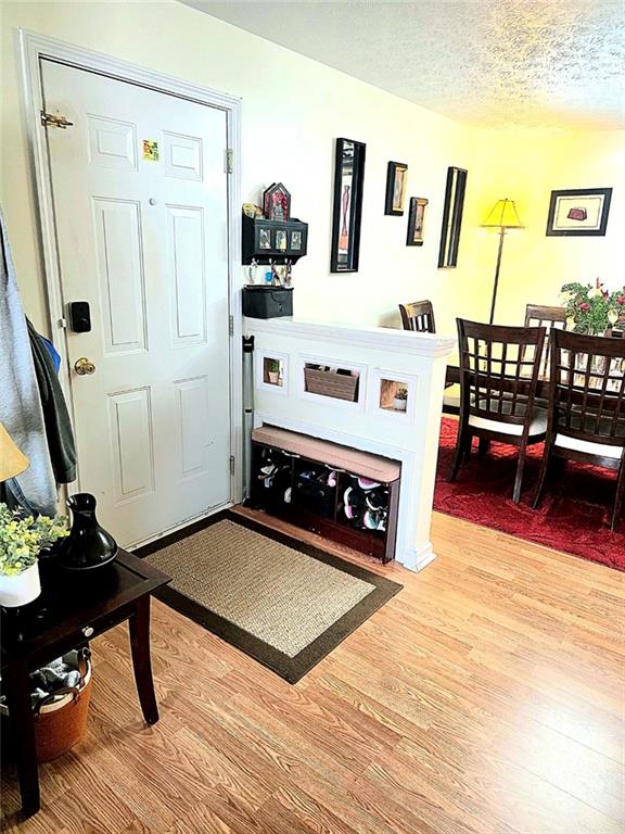 5303 Par 4 Way Lithonia, GA 30038 - Photo 2 of 28 a living room with furniture and wooden floor