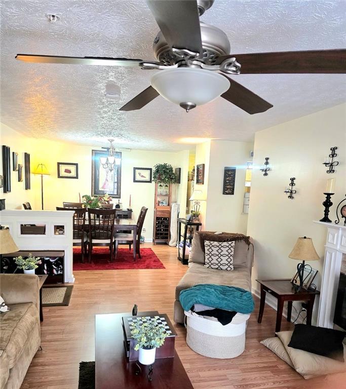 5303 Par 4 Way Lithonia, GA 30038 - Photo 27 of 28 a living room with furniture and a wooden floor