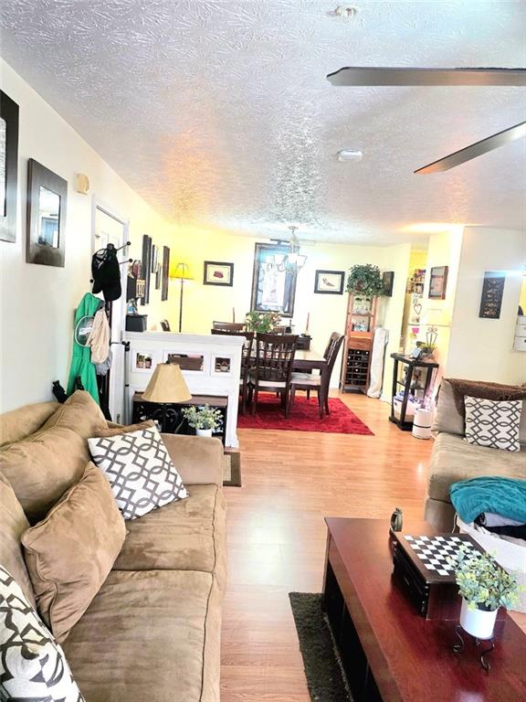 5303 Par 4 Way Lithonia, GA 30038 - Photo 8 of 28 a living room with lots of furniture and view of dining room