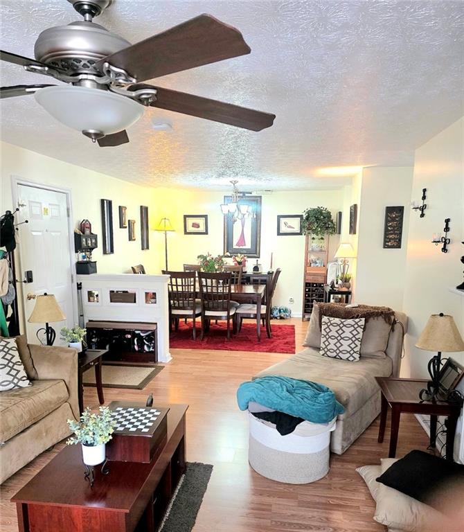 5303 Par 4 Way Lithonia, GA 30038 - Photo 9 of 28 a living room with furniture and wooden floor