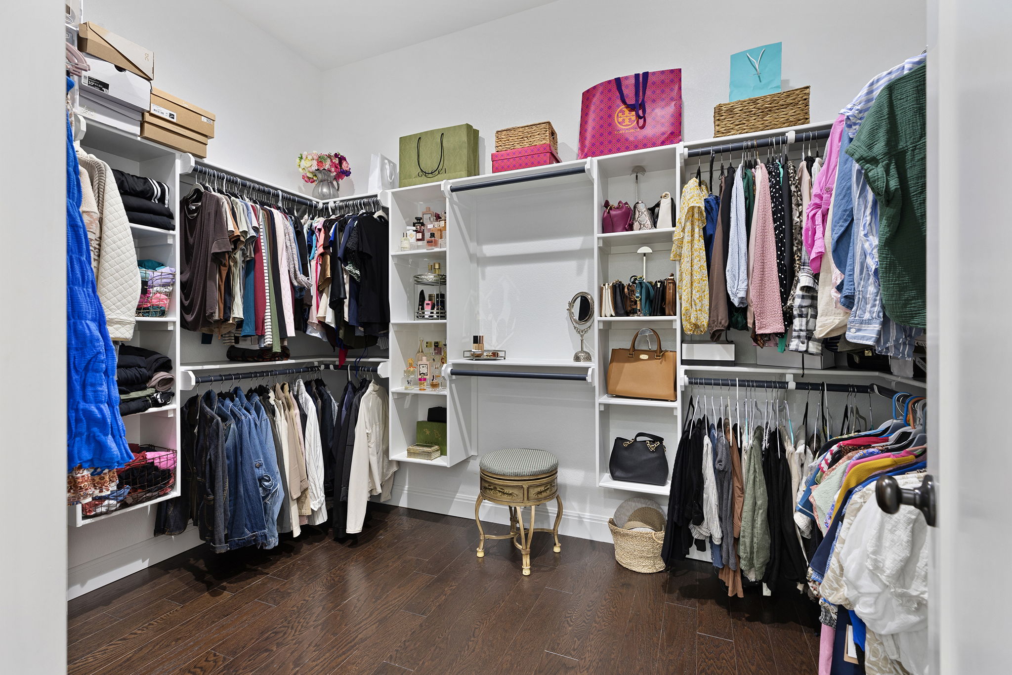 153 Fawn Hollow Elgin, TX 78621 - Photo 22 of 40 a view of walk in closet with clothes and shoes