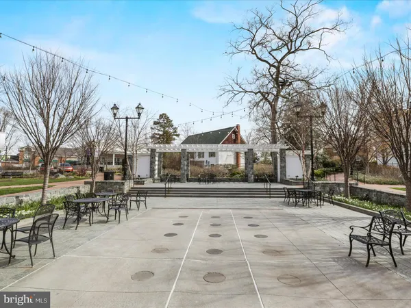 a view of a chairs and tables in the patio