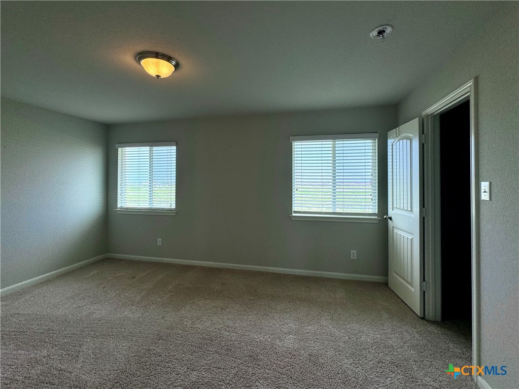 942 Pumpkin Ridge New Braunfels, TX 78130 - Photo 12 of 18 an empty room with windows
