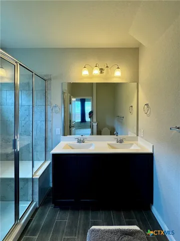 a view of backyard with seating area