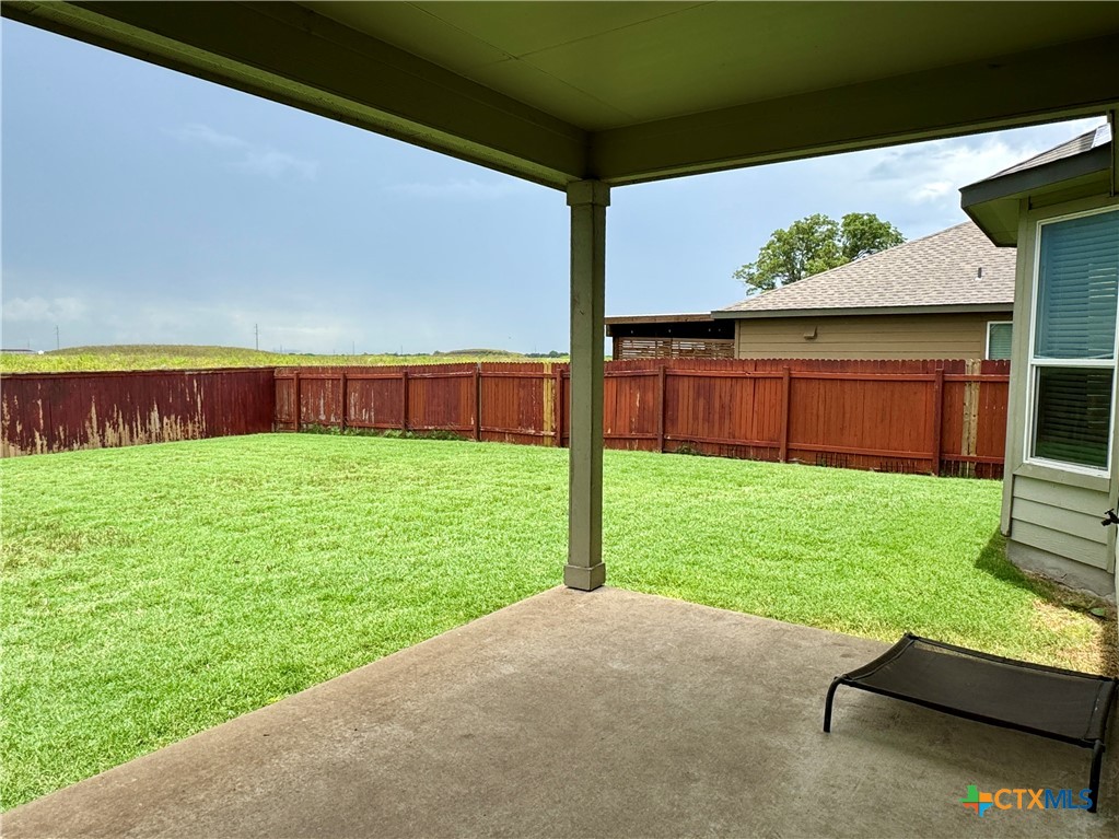942 Pumpkin Ridge New Braunfels, TX 78130 - Photo 17 of 18 a view of backyard with seating area