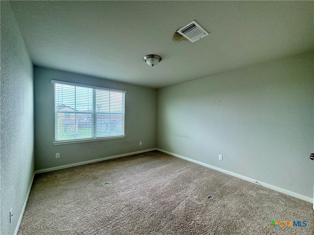 942 Pumpkin Ridge New Braunfels, TX 78130 - Photo 10 of 18 an empty room with a window