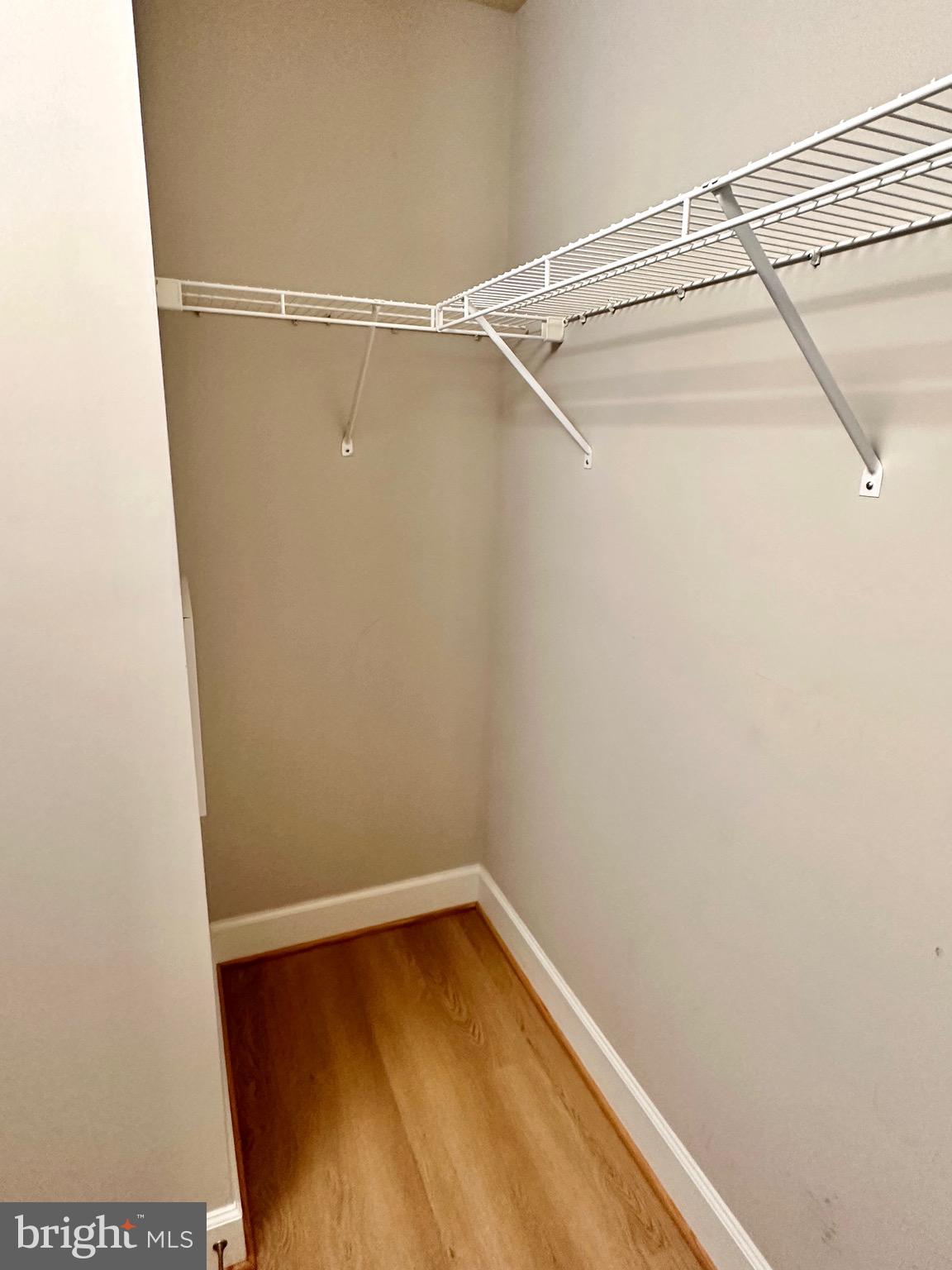 3600 South Glebe Road, Unit 507W Arlington, VA 22202 - Photo 12 of 23 a view of a room with racks on the wall