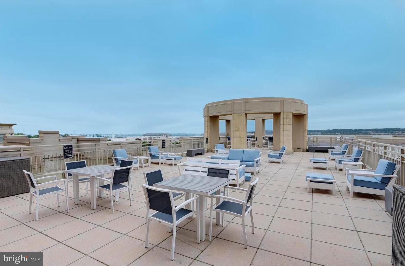 3600 South Glebe Road, Unit 507W Arlington, VA 22202 - Photo 23 of 23 a view of a terrace with furniture and a table