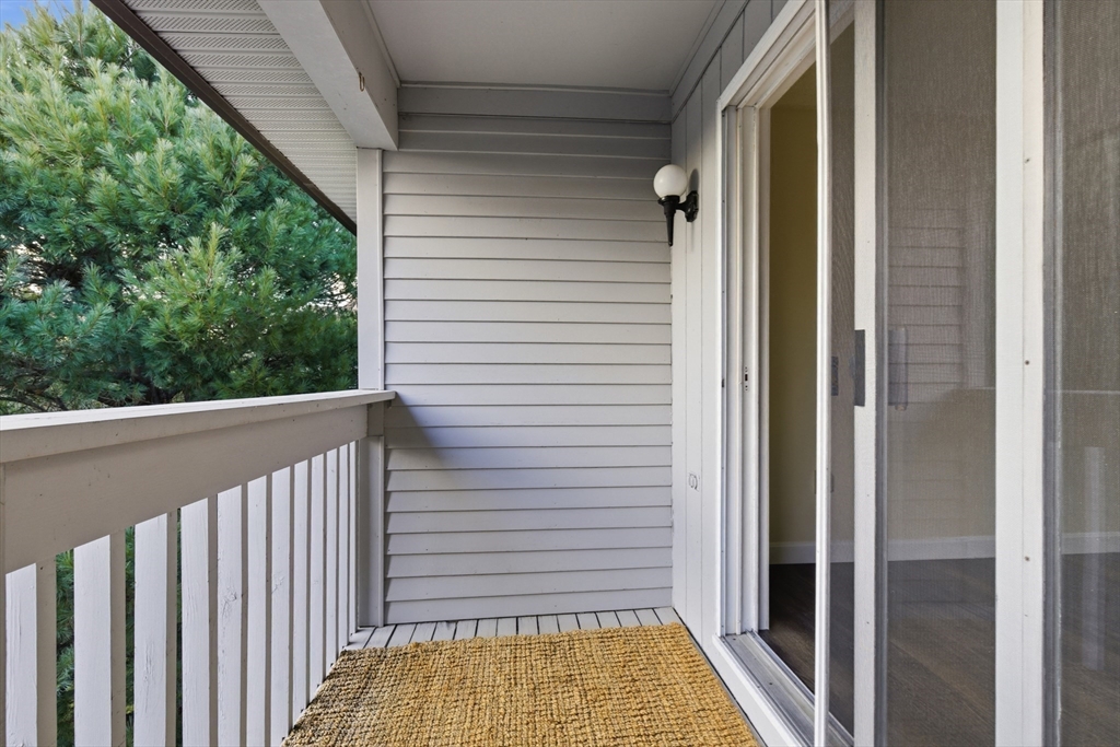2211 Franklin Crossing Road, Unit 2211 Franklin, MA 02038 - Photo 12 of 32 a view of balcony with wooden floor