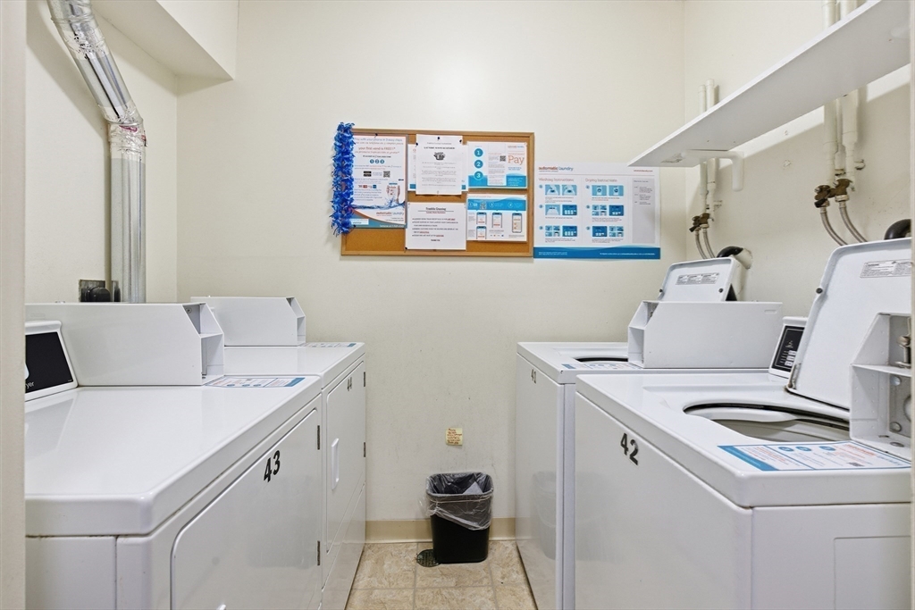 2211 Franklin Crossing Road, Unit 2211 Franklin, MA 02038 - Photo 18 of 32 a utility room with dryer and washer