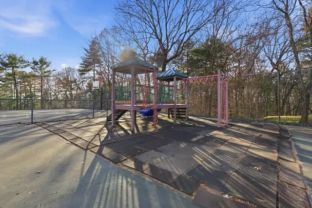 a view of a backyard with sitting area
