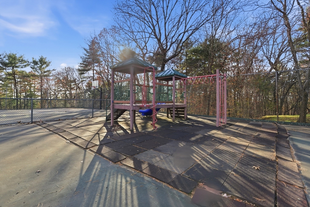 2211 Franklin Crossing Road, Unit 2211 Franklin, MA 02038 - Photo 24 of 32 a view of a backyard with sitting area