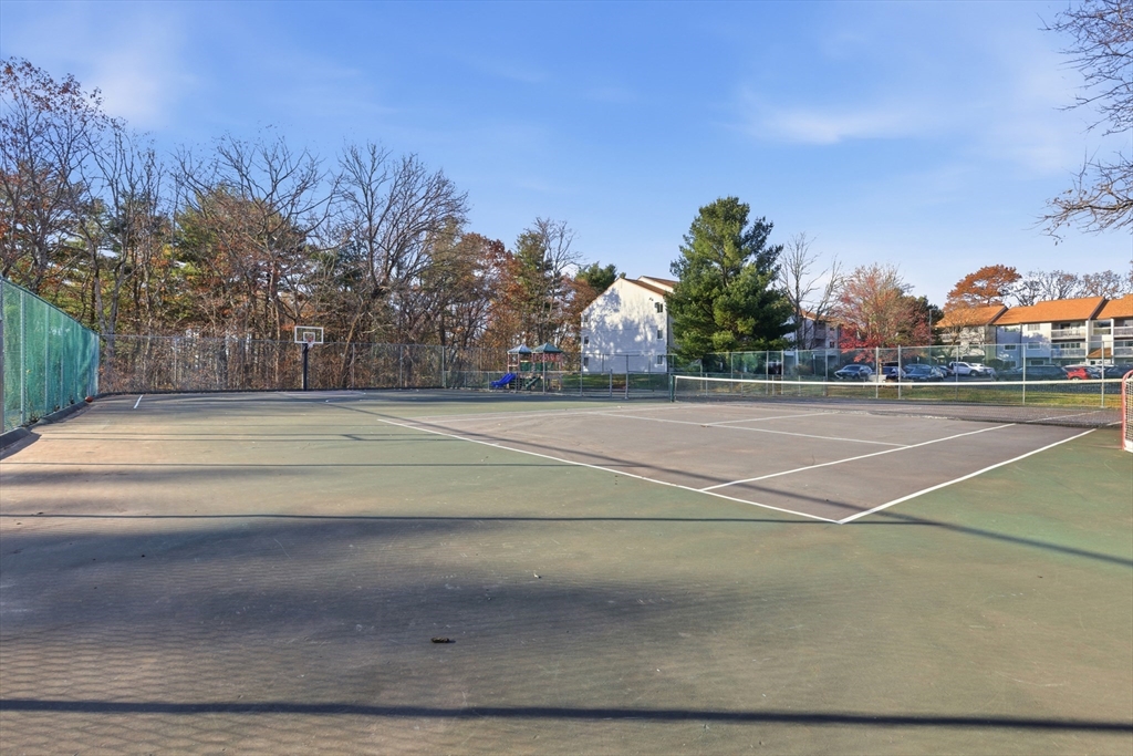 2211 Franklin Crossing Road, Unit 2211 Franklin, MA 02038 - Photo 26 of 32 a view of a tennis court