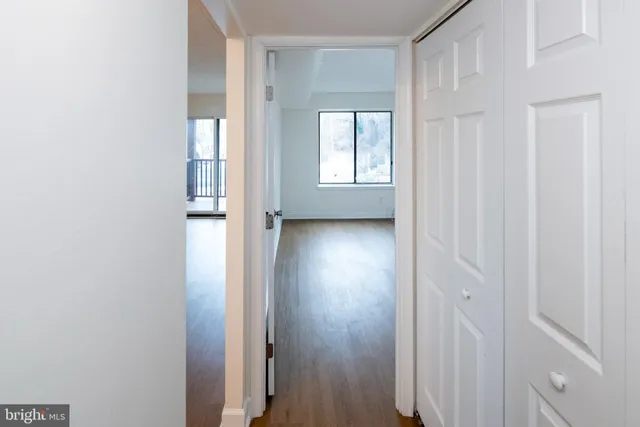 a view of a room that has a window in it