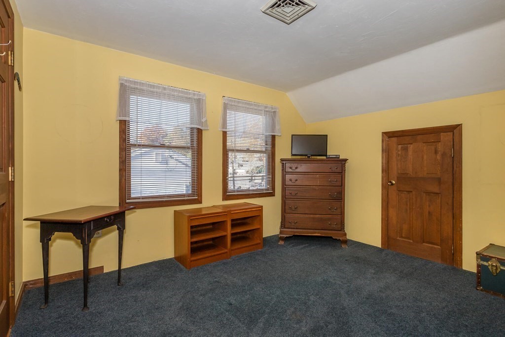 49 Pleasant Circle Canton, MA 02021 - Photo 20 of 25 a view of room with furniture and windows