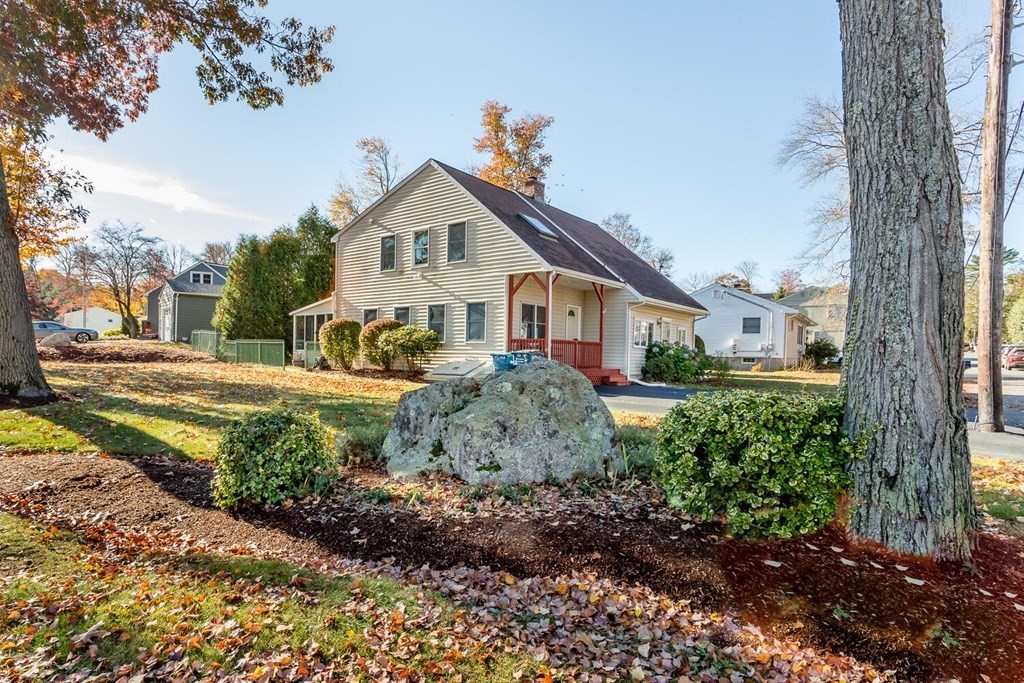 49 Pleasant Circle Canton, MA 02021 - Photo 2 of 25 a front view of a house with garden