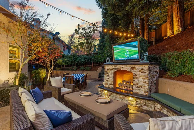 a view of a backyard with a small swimming pool