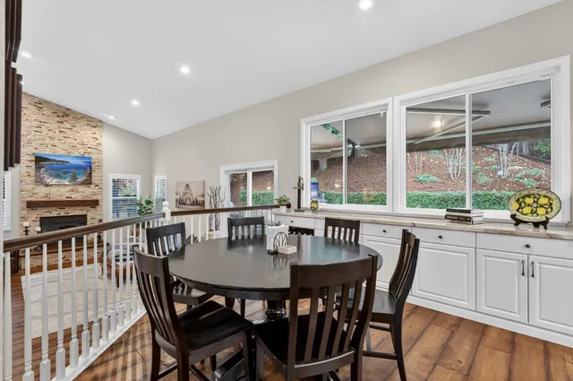 a view of a room with gym equipment and a window