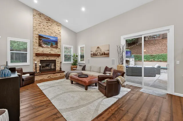 an aerial view of residential house with outdoor space and swimming pool