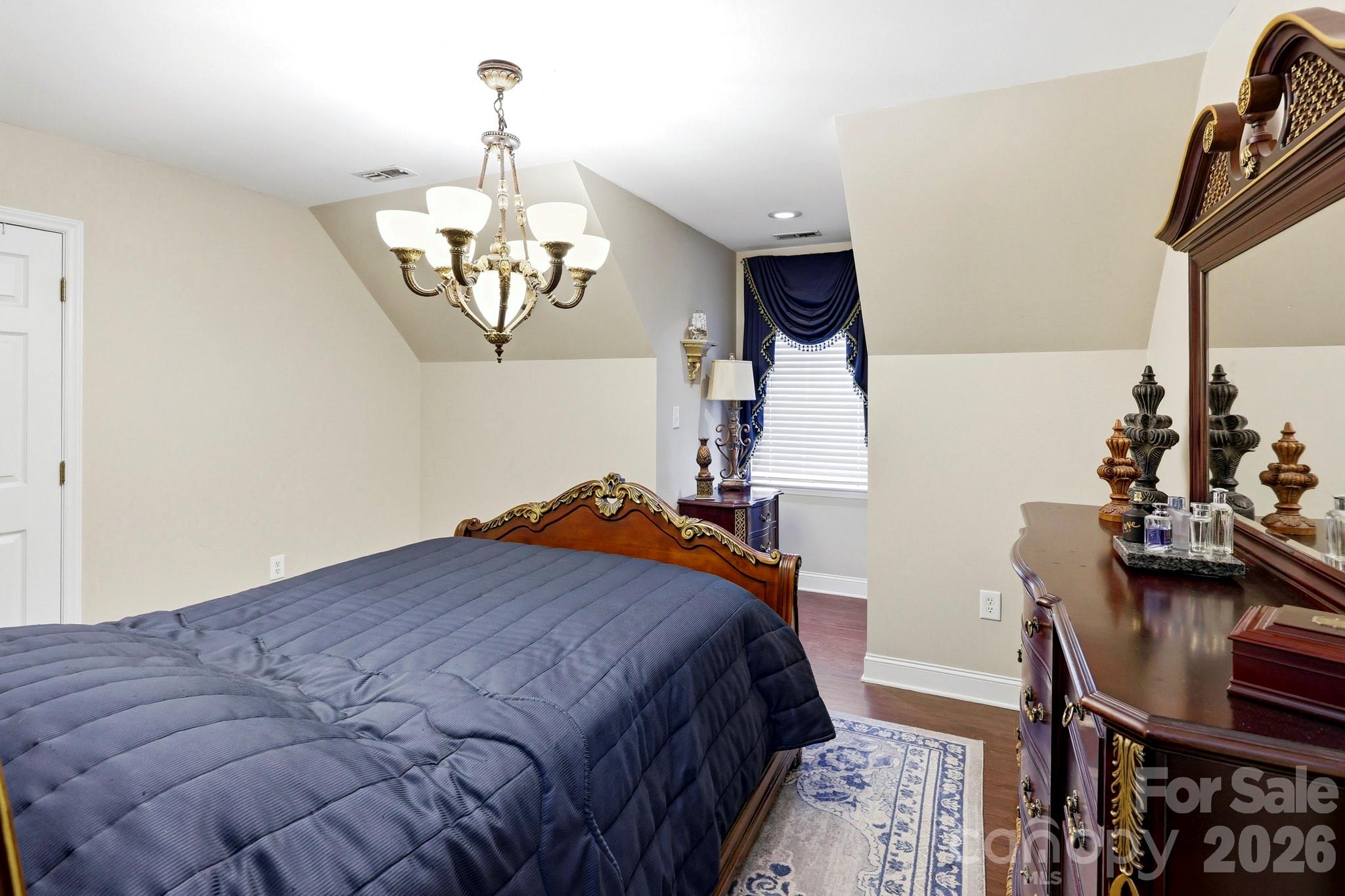 327 Sherry Street Rutherfordton, NC 28139 - Photo 17 of 22 a bedroom with bed and window