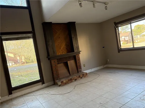 an empty room with windows