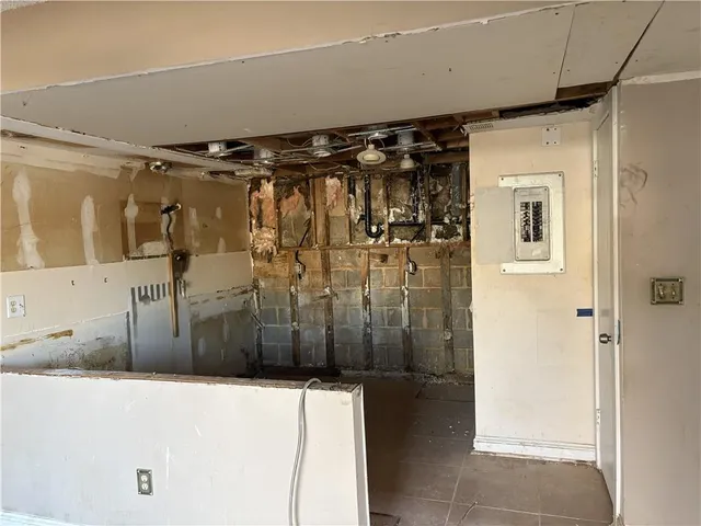 a view of a refrigerator in a kitchen