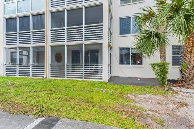 a house view with a garden space