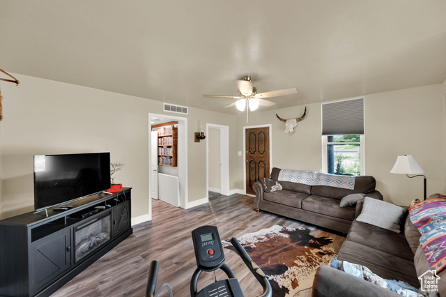 1632 South Main Street Springville, UT 84663 - Photo 7 of 93 Living room featuring wood finished floors and ceiling fan