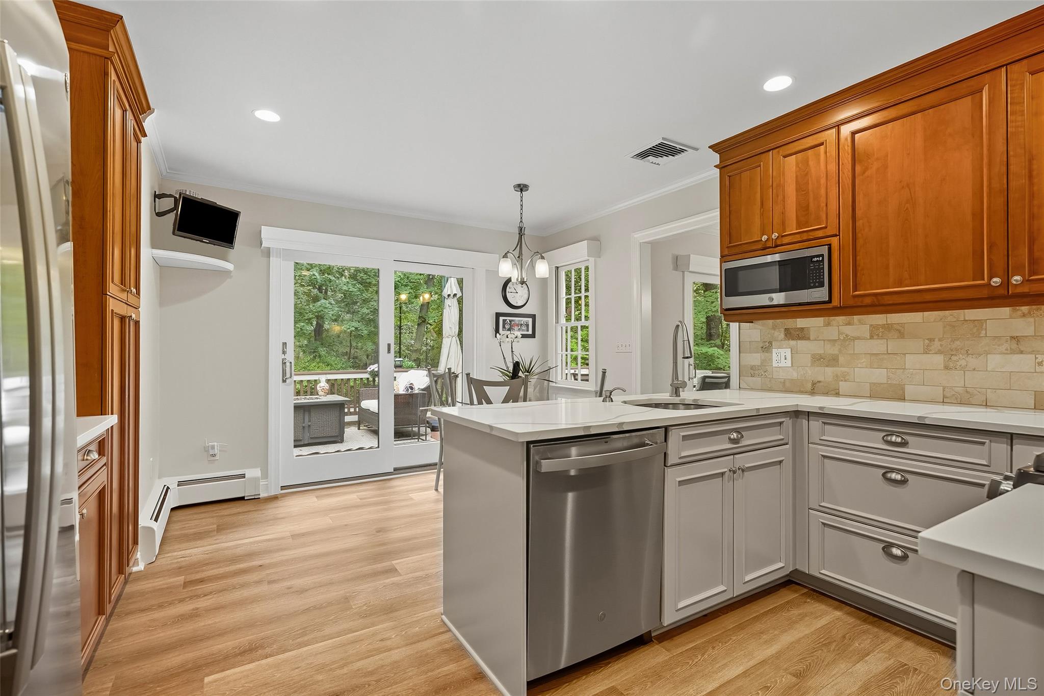 80 North Street Rye, NY 10580 - Photo 12 of 37 a kitchen with a sink stove and cabinets