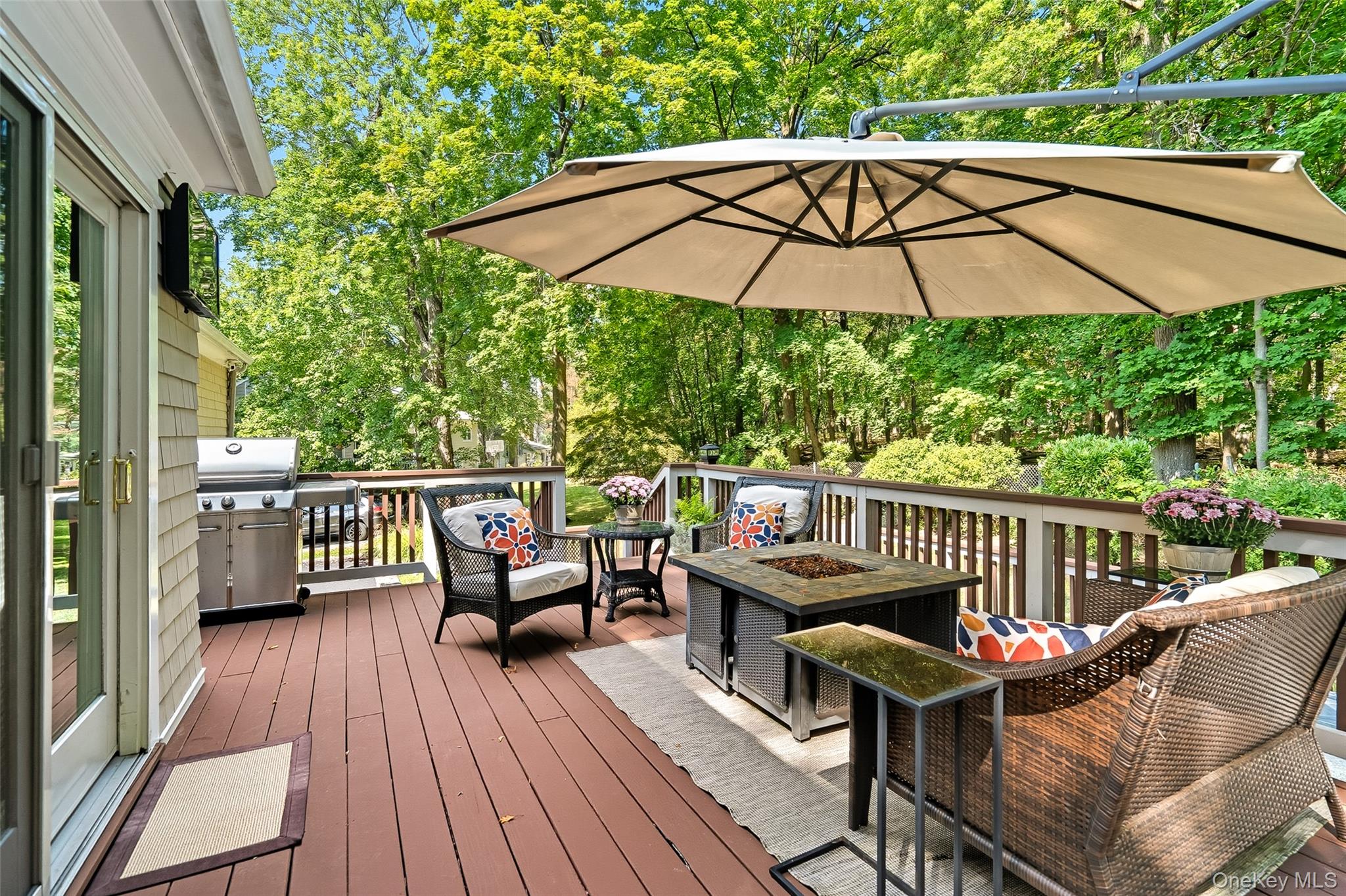 80 North Street Rye, NY 10580 - Photo 14 of 37 a view of a deck with furniture and wooden floor