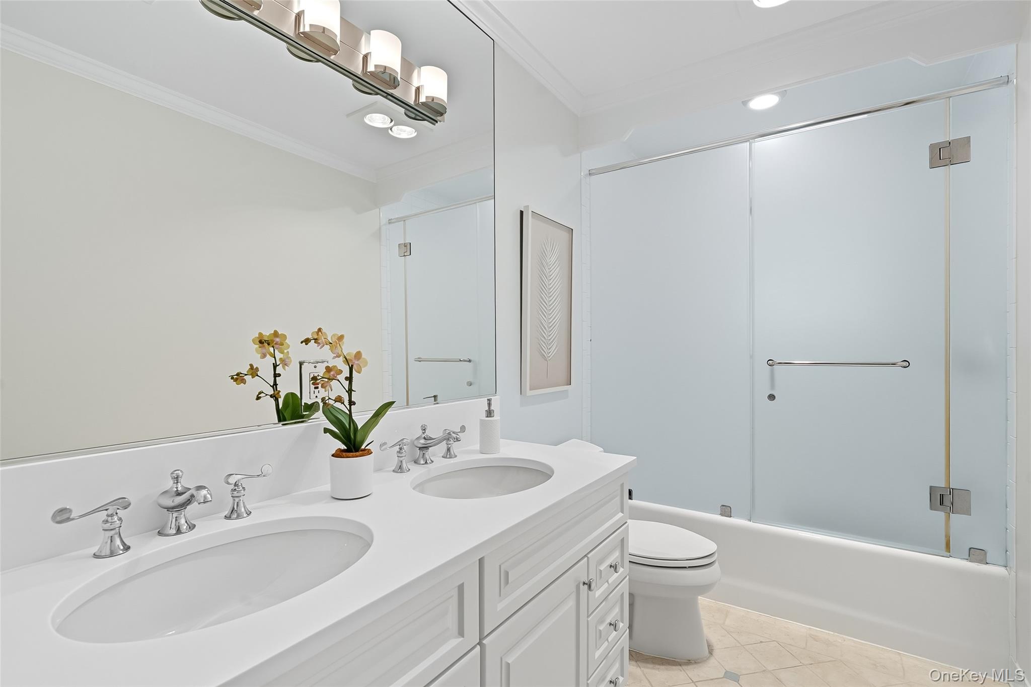 80 North Street Rye, NY 10580 - Photo 21 of 37 a bathroom with a sink a toilet and shower