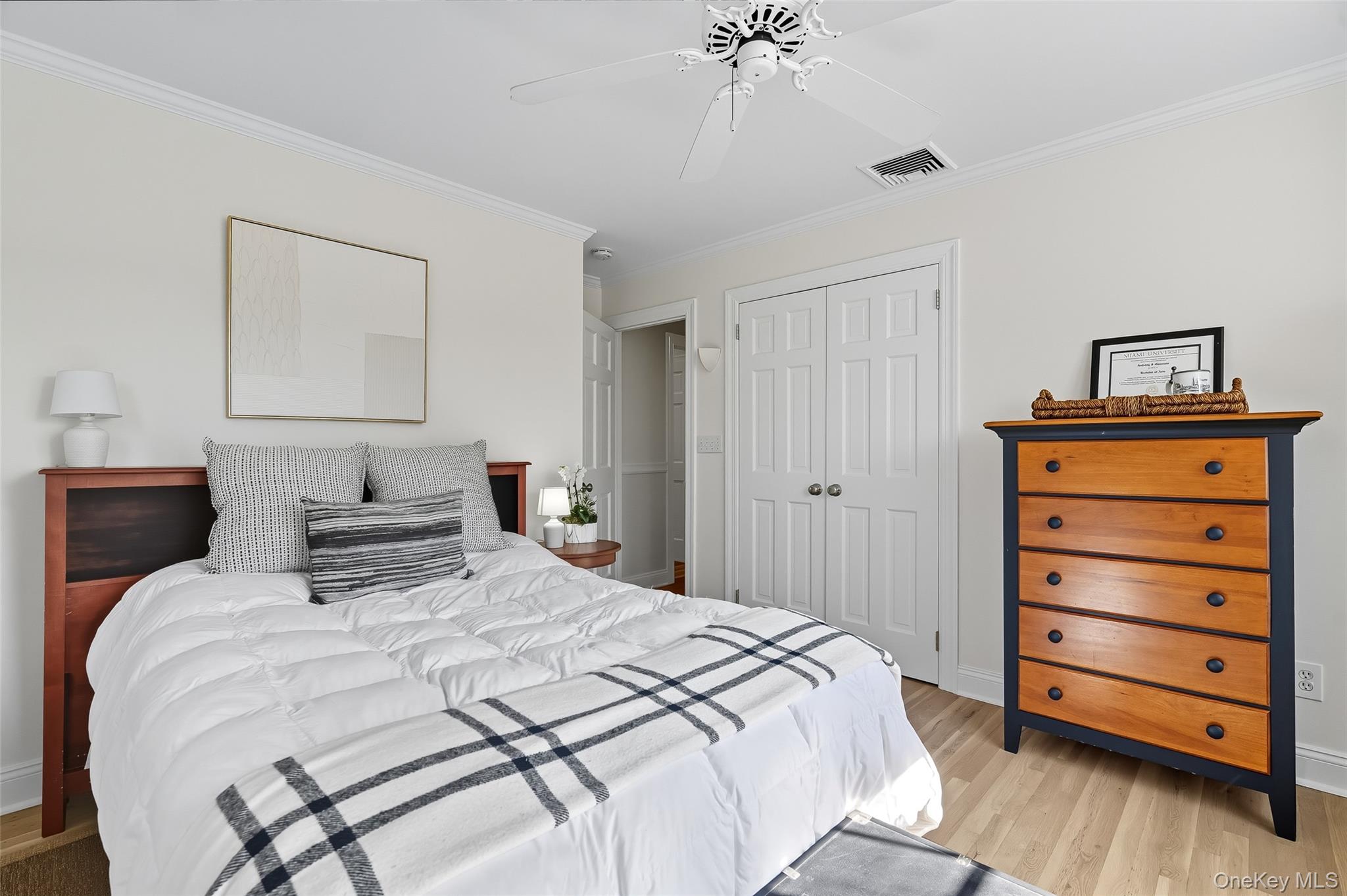 80 North Street Rye, NY 10580 - Photo 22 of 37 a bedroom with a bed and a dresser