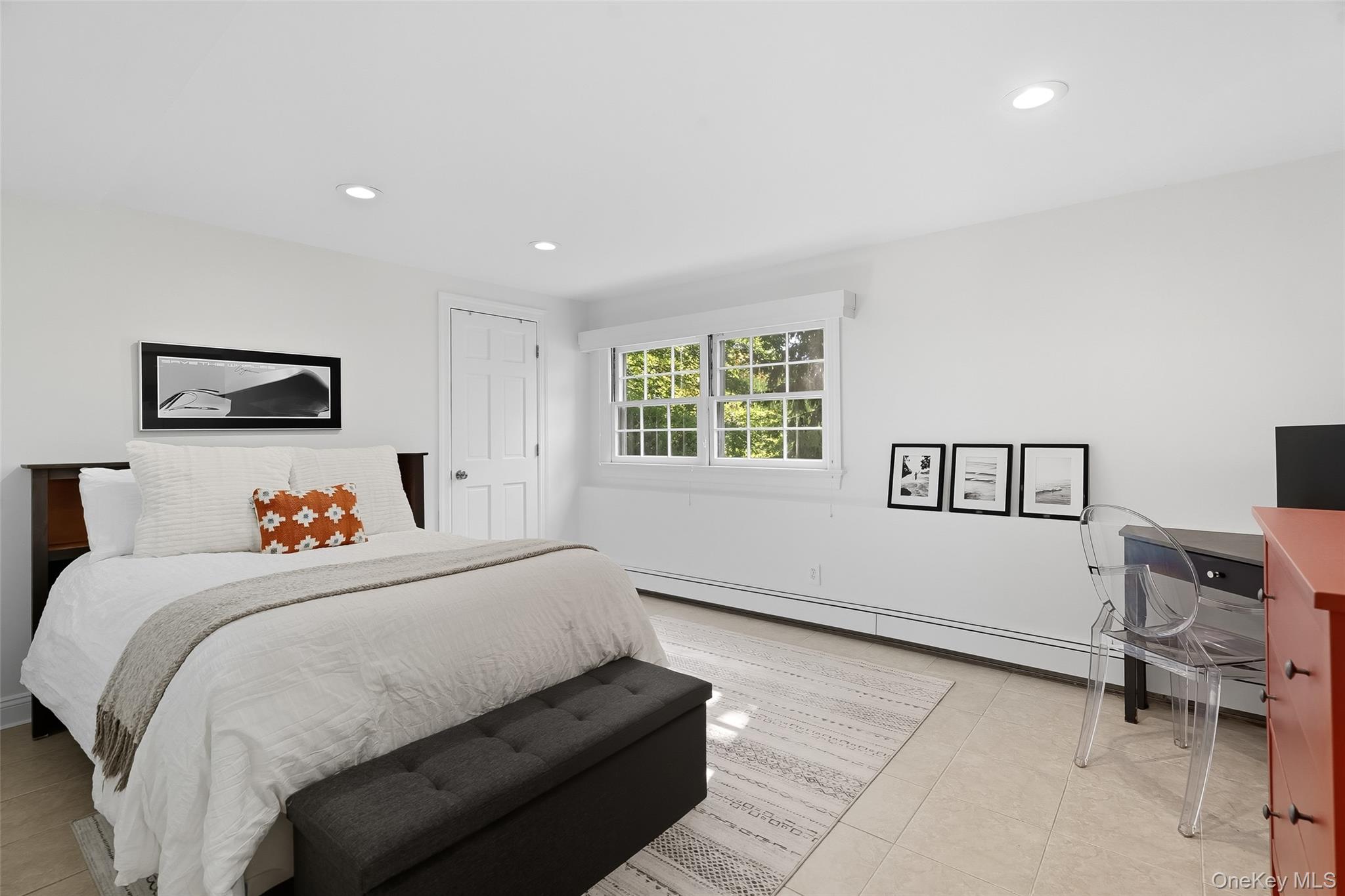 80 North Street Rye, NY 10580 - Photo 23 of 37 a bedroom with a bed and a couch