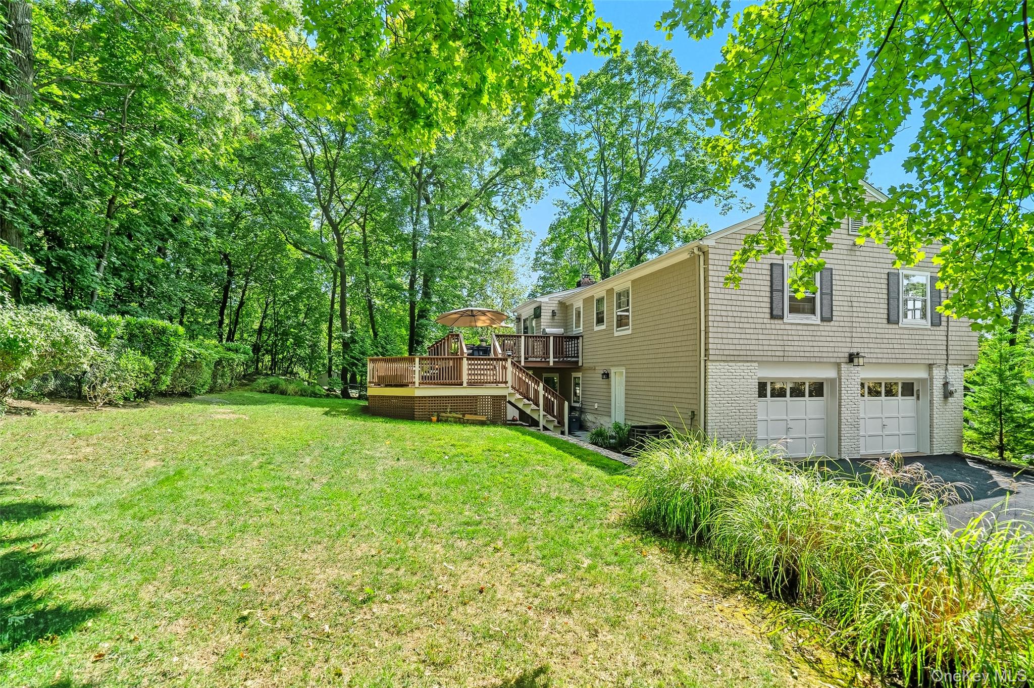 80 North Street Rye, NY 10580 - Photo 3 of 37 a view of a house with backyard and sitting area