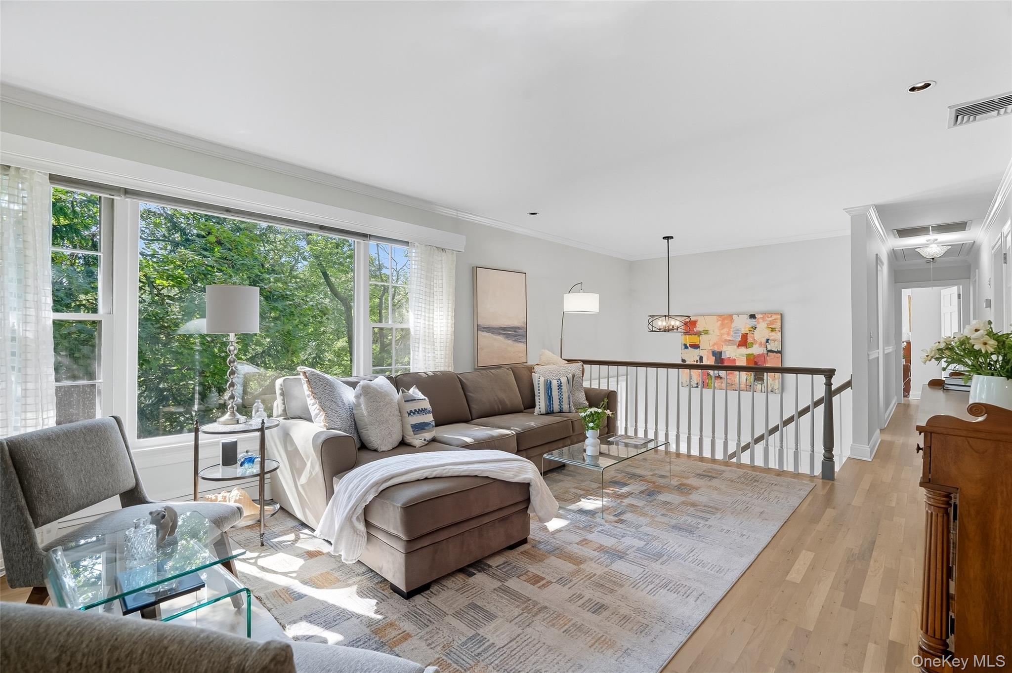 80 North Street Rye, NY 10580 - Photo 6 of 37 a living room with furniture and a large window