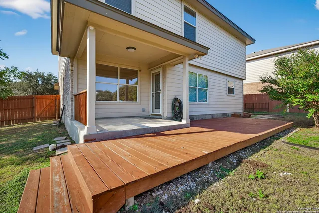 a view of a backyard with a small cabin