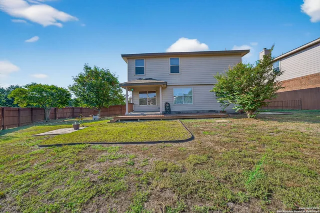 a view of swimming pool with a yard