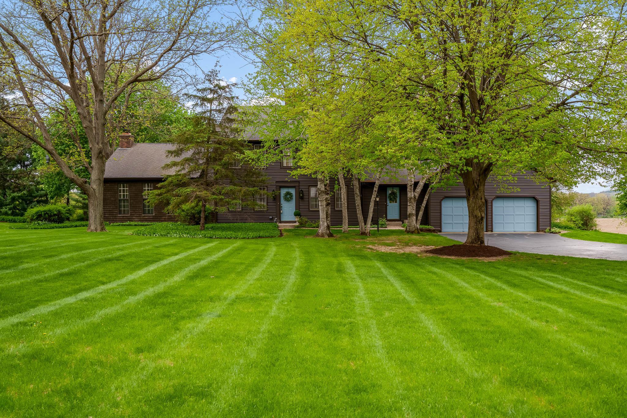 10562 Town Hall Road Belvidere, IL 61008 - Photo 57 of 72 a view of a house with a yard porch and sitting area