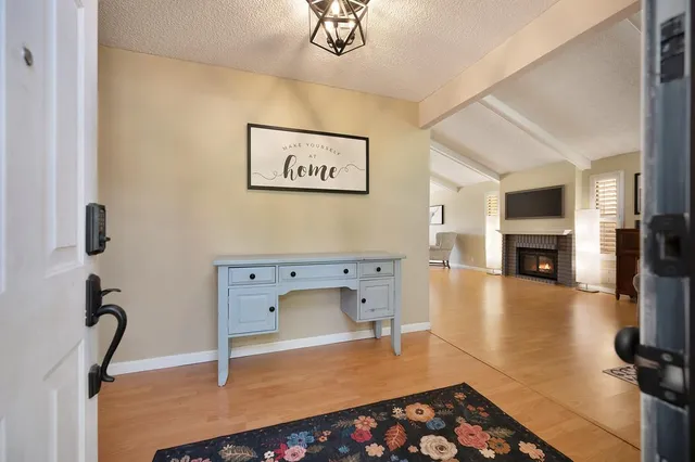 a room with furniture and a fireplace