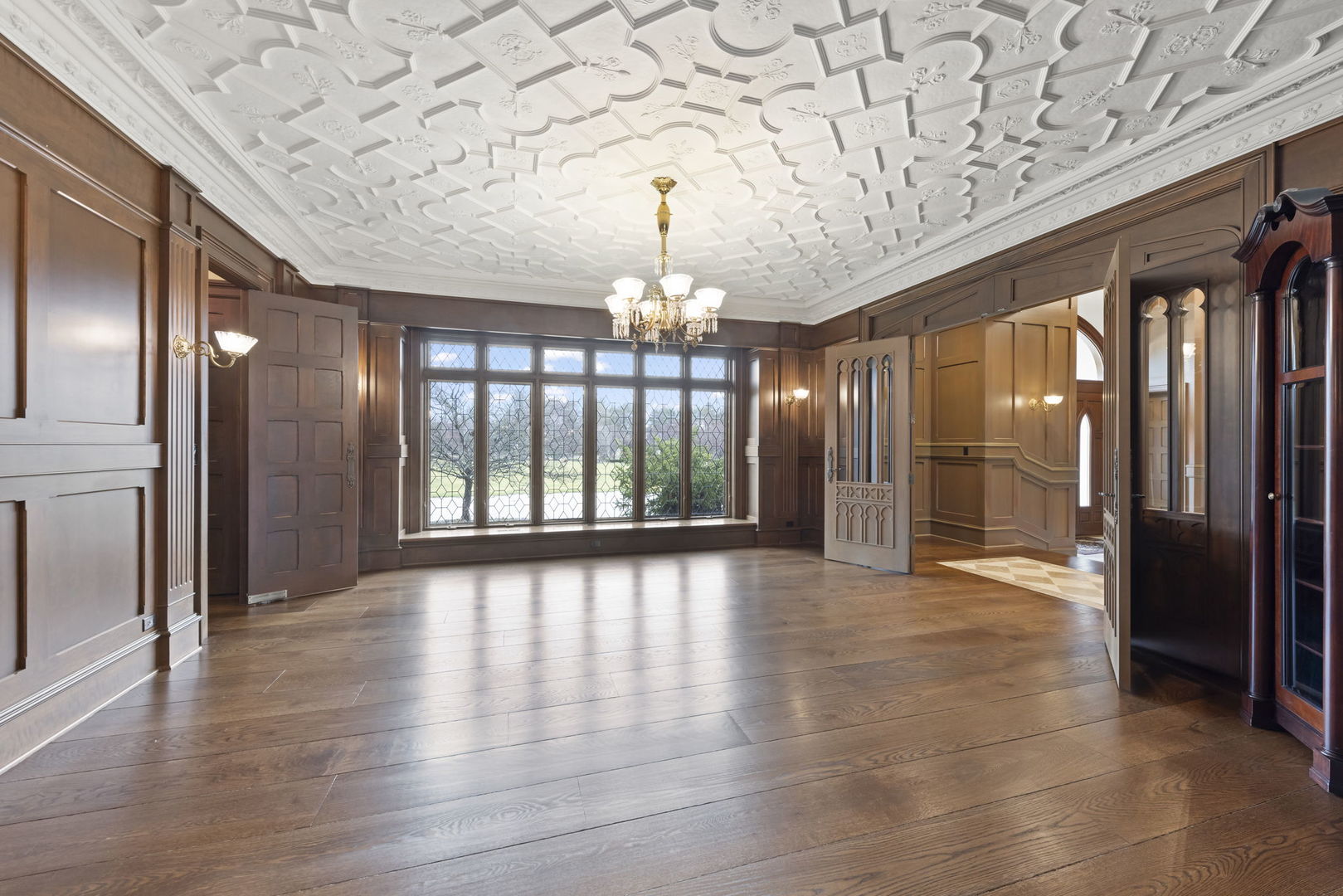 24W141 Hobson Road Naperville, IL 60540 - Photo 13 of 70 a view of an entryway with a chandelier