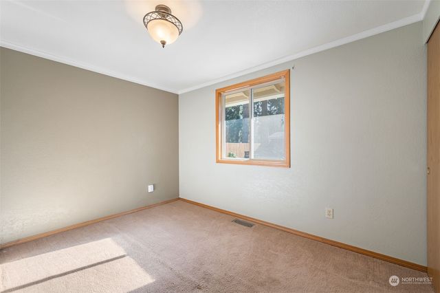 an empty room with window