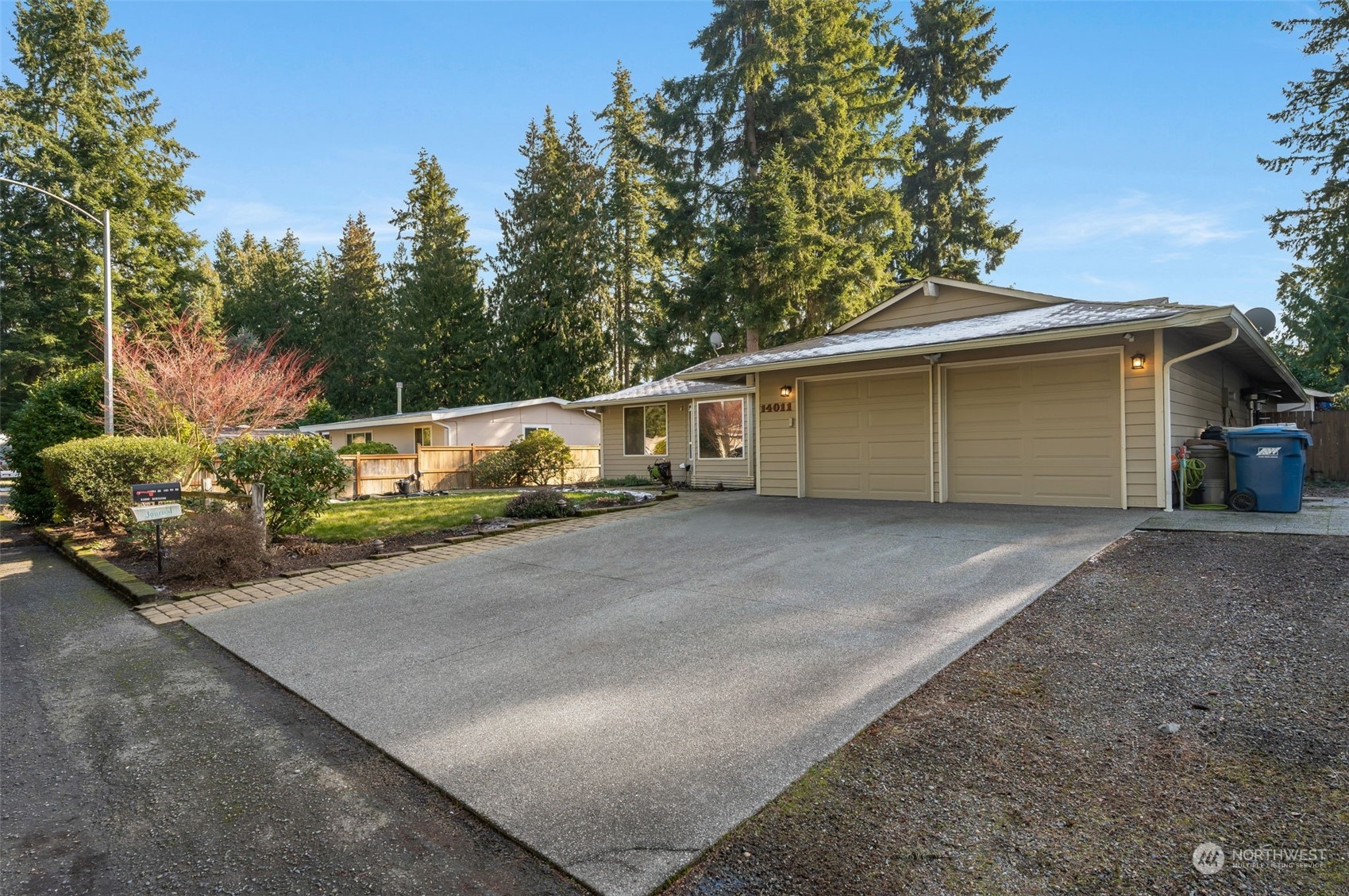 14011 Southeast 142nd Street Renton, WA 98059 - Photo 3 of 39 a view of back yard of the house