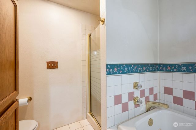 a bathroom with a sink and a shower