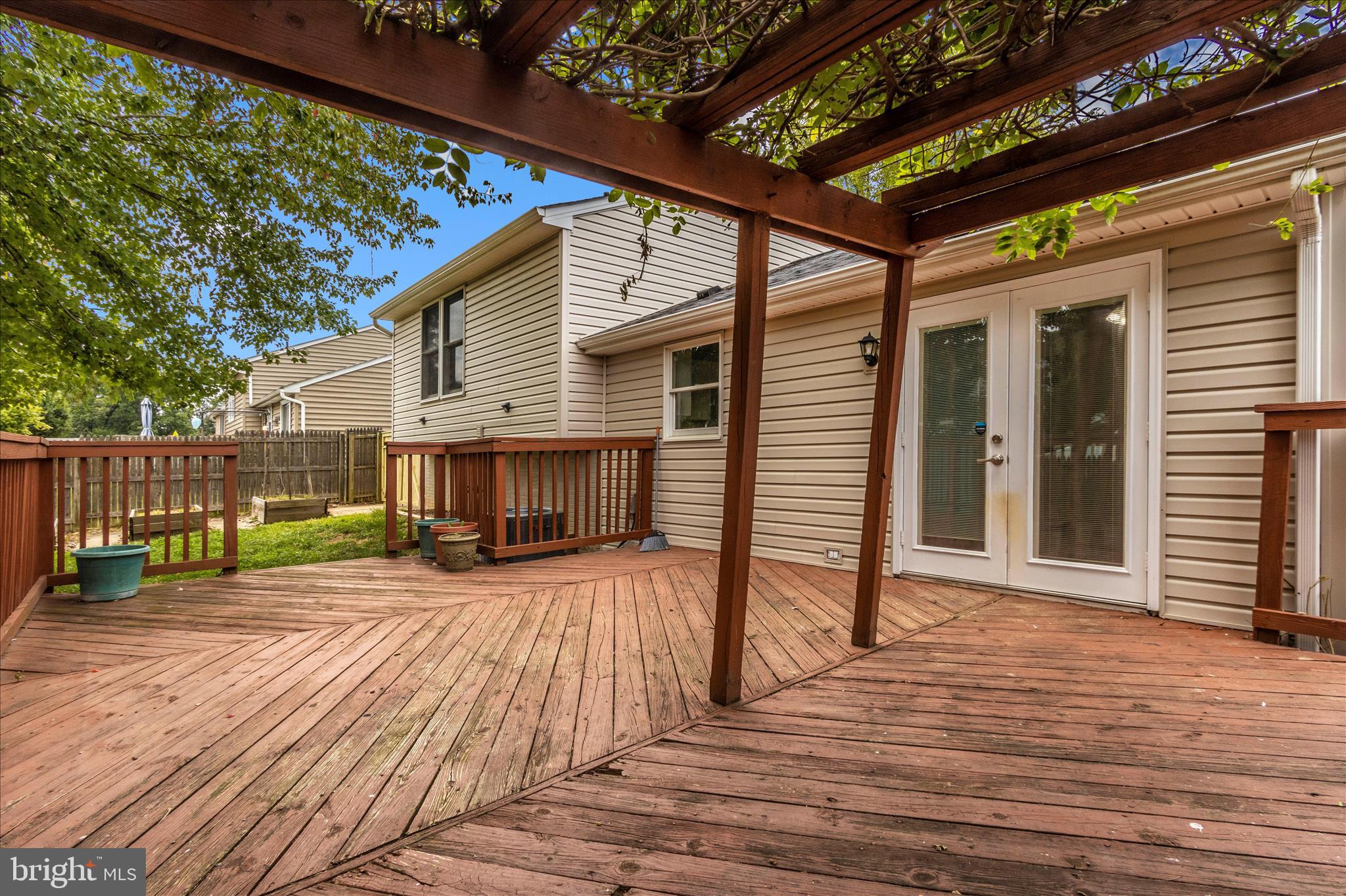207 Contour Road Mount Airy, MD 21771 - Photo 47 of 52 a view of a house with wooden deck